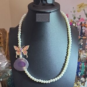 Elegant Pearl Necklace with Purple Pendant and Butterfly Accent